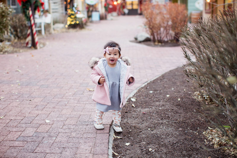 Toddler girl wearing pink and grey