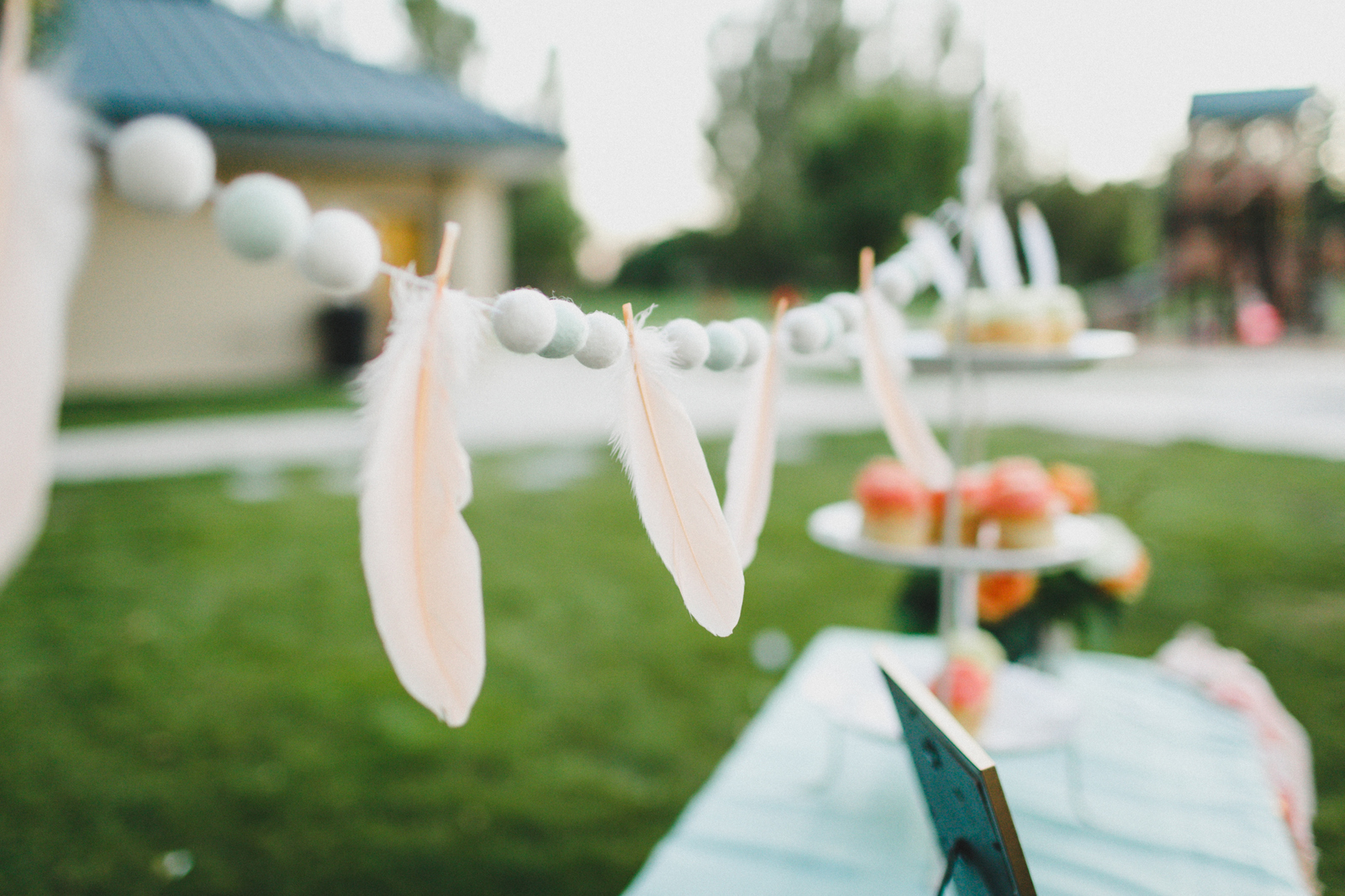 Feather garland at Boho Birthday Bash - Photo by Summer Nicole Photo