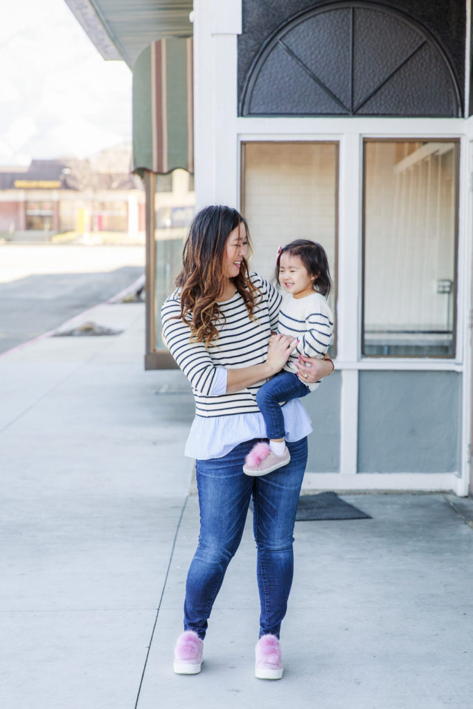 Mommy and me outfits: striped shirts and pom pom shoes