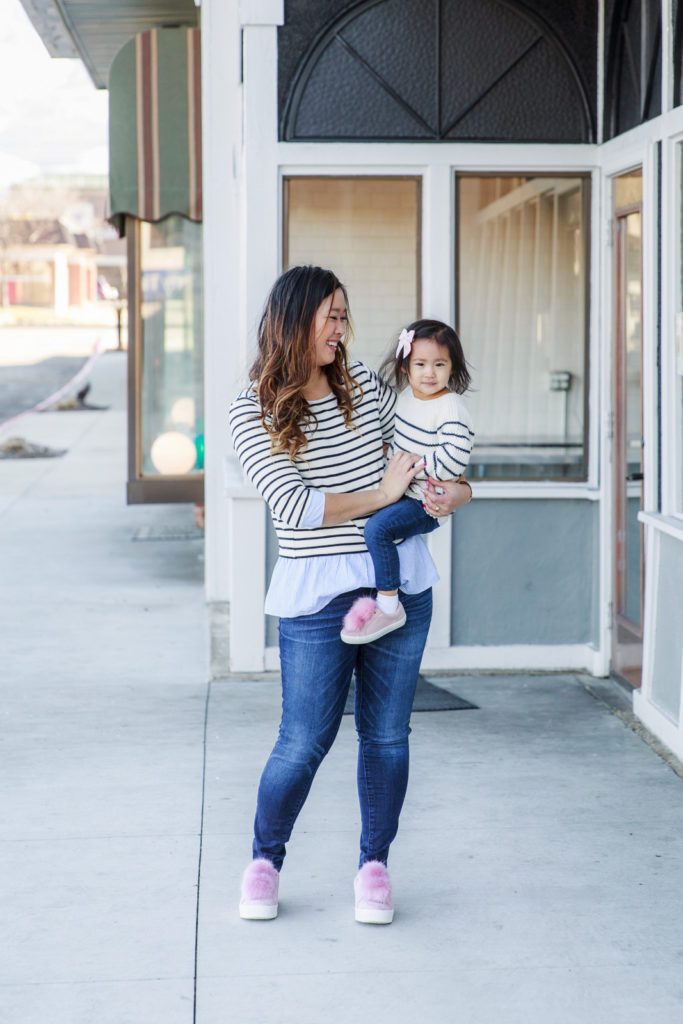 Mommy and me outfits: striped shirts and pom pom shoes