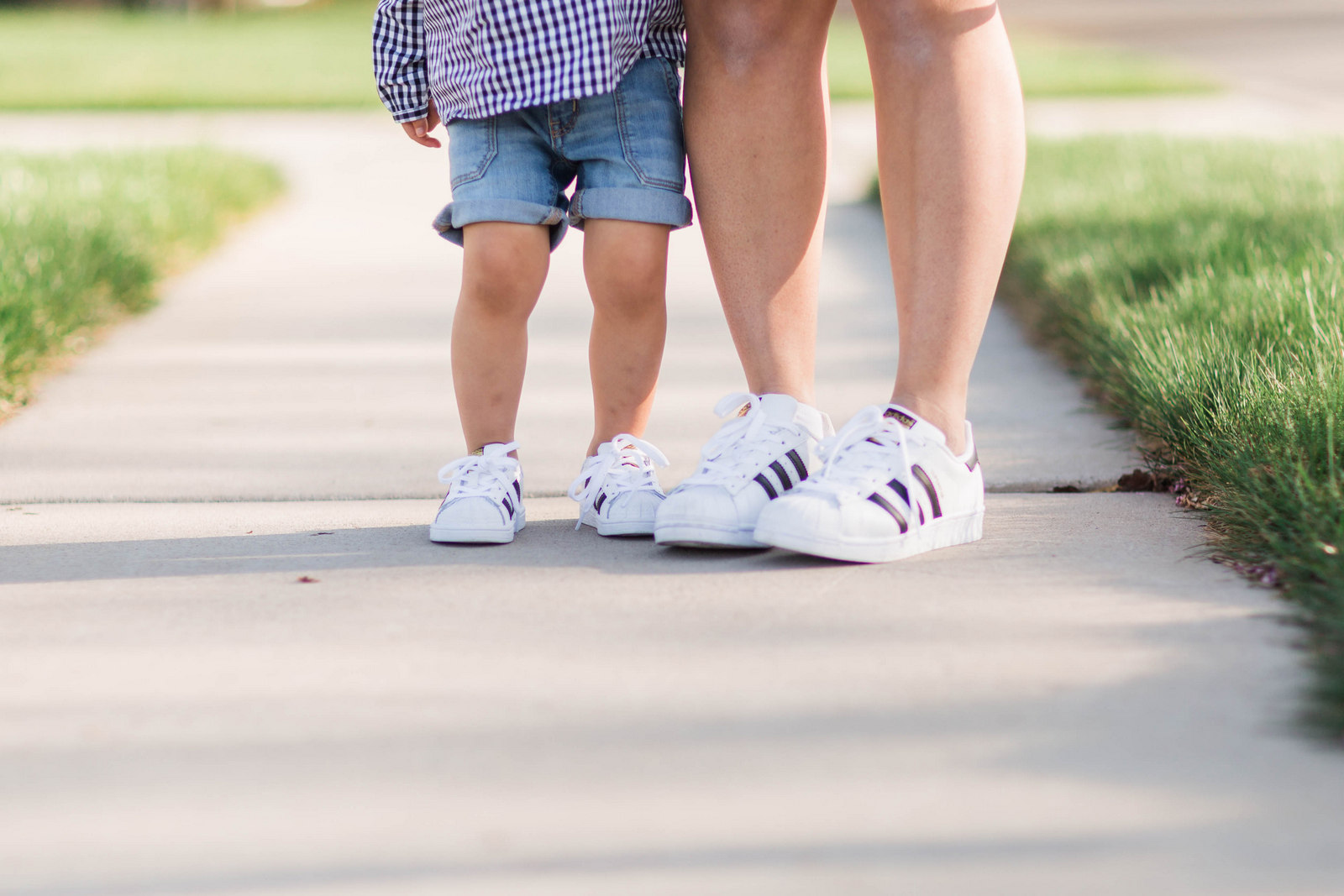 Mommy and Me Outfit: Ruffles and Adidas Superstars Black and White by fashion blogger Sandy A La Mode