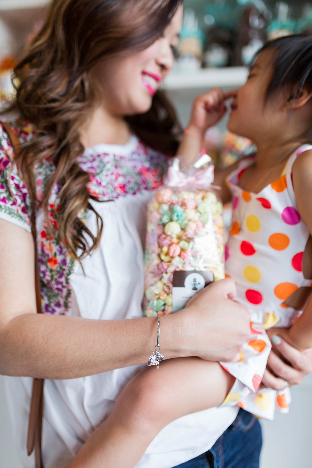 Mommy and Me Outfits: Colorful Floral Top and Polka Dots by fashion blogger Sandy A La Mode