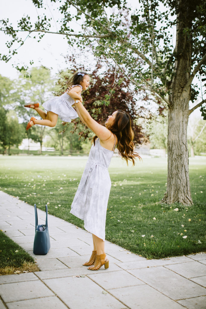 Mommy and Me Outfits: Grey Floral Dresses by Utah fashion blogger Sandy A La Mode