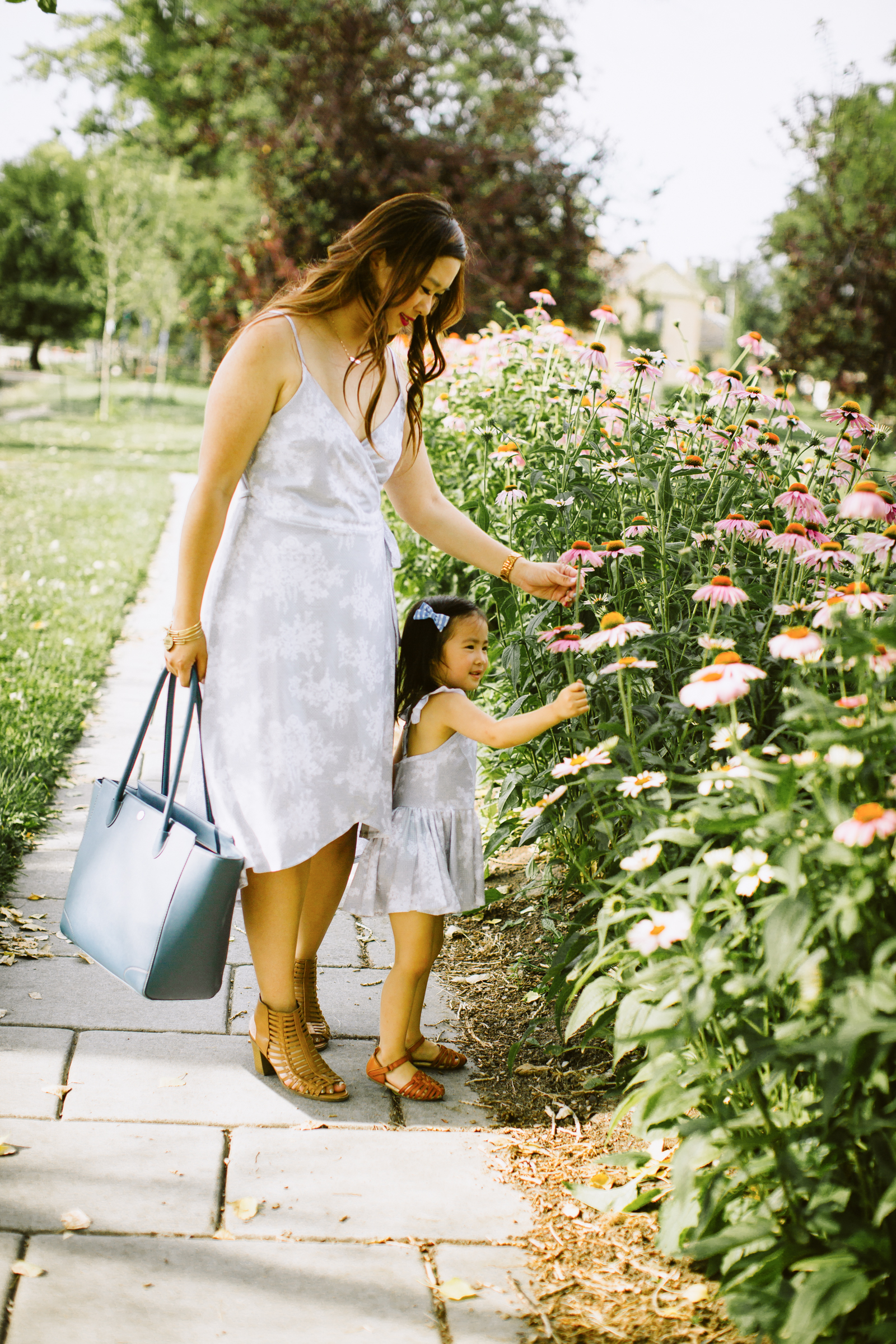 Mommy and Me Outfits: Grey Floral Dresses by Utah fashion blogger Sandy A La Mode