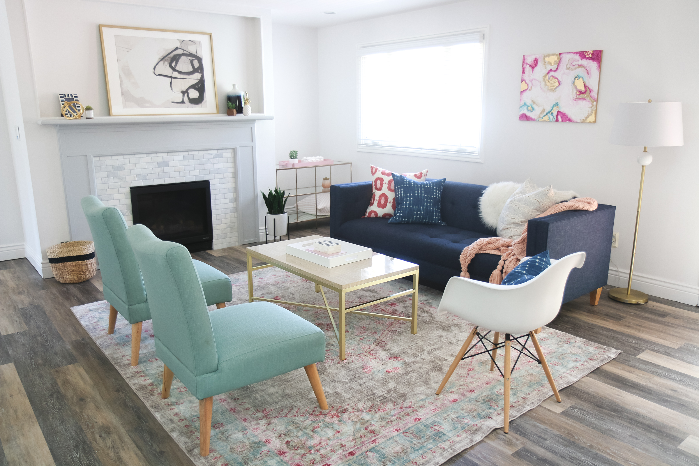 Our New Home Big Reveal: How We Styled Our Navy Couch by popular Utah blogger Sandy A La Mode