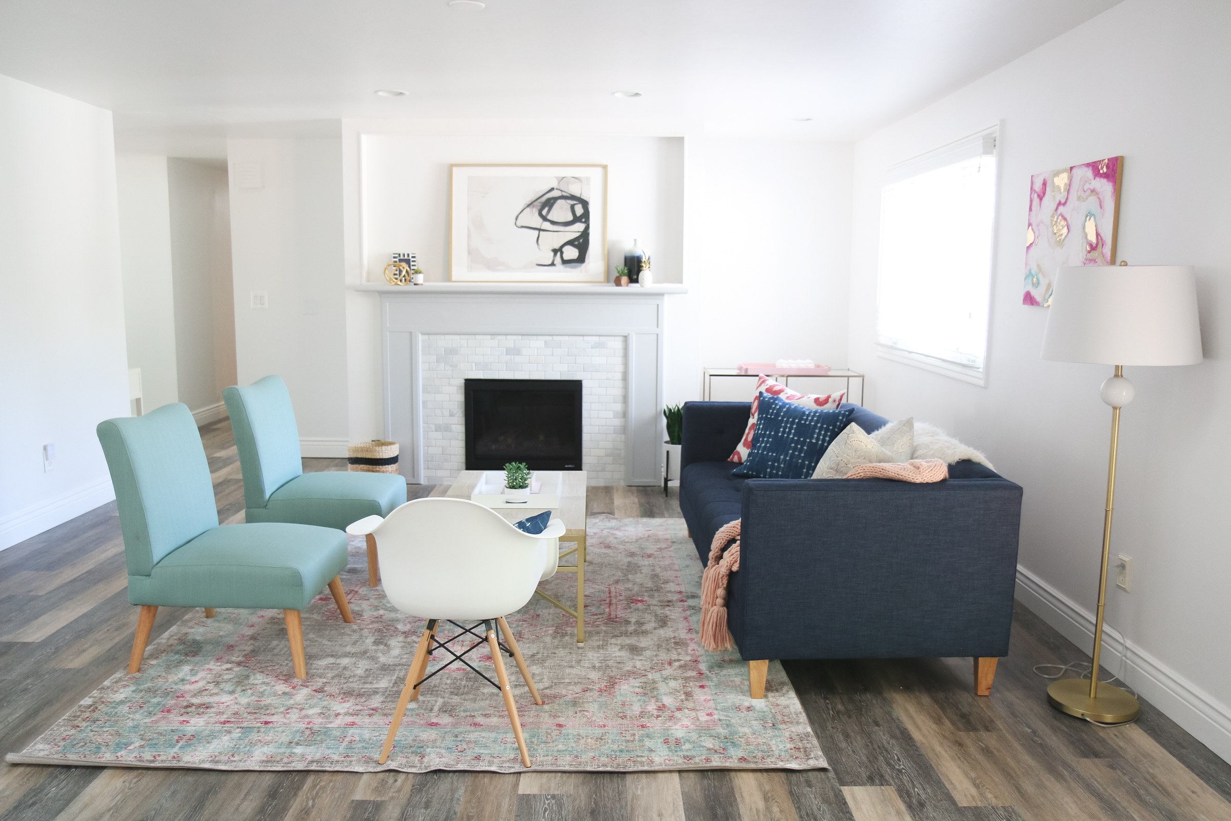Our New Home Big Reveal: How We Styled Our Navy Couch by popular Utah blogger Sandy A La Mode