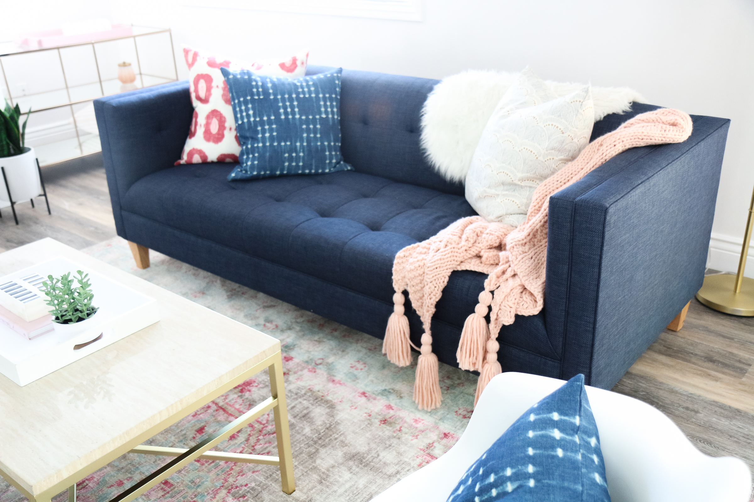 Our New Home Big Reveal: How We Styled Our Navy Couch by popular Utah blogger Sandy A La Mode