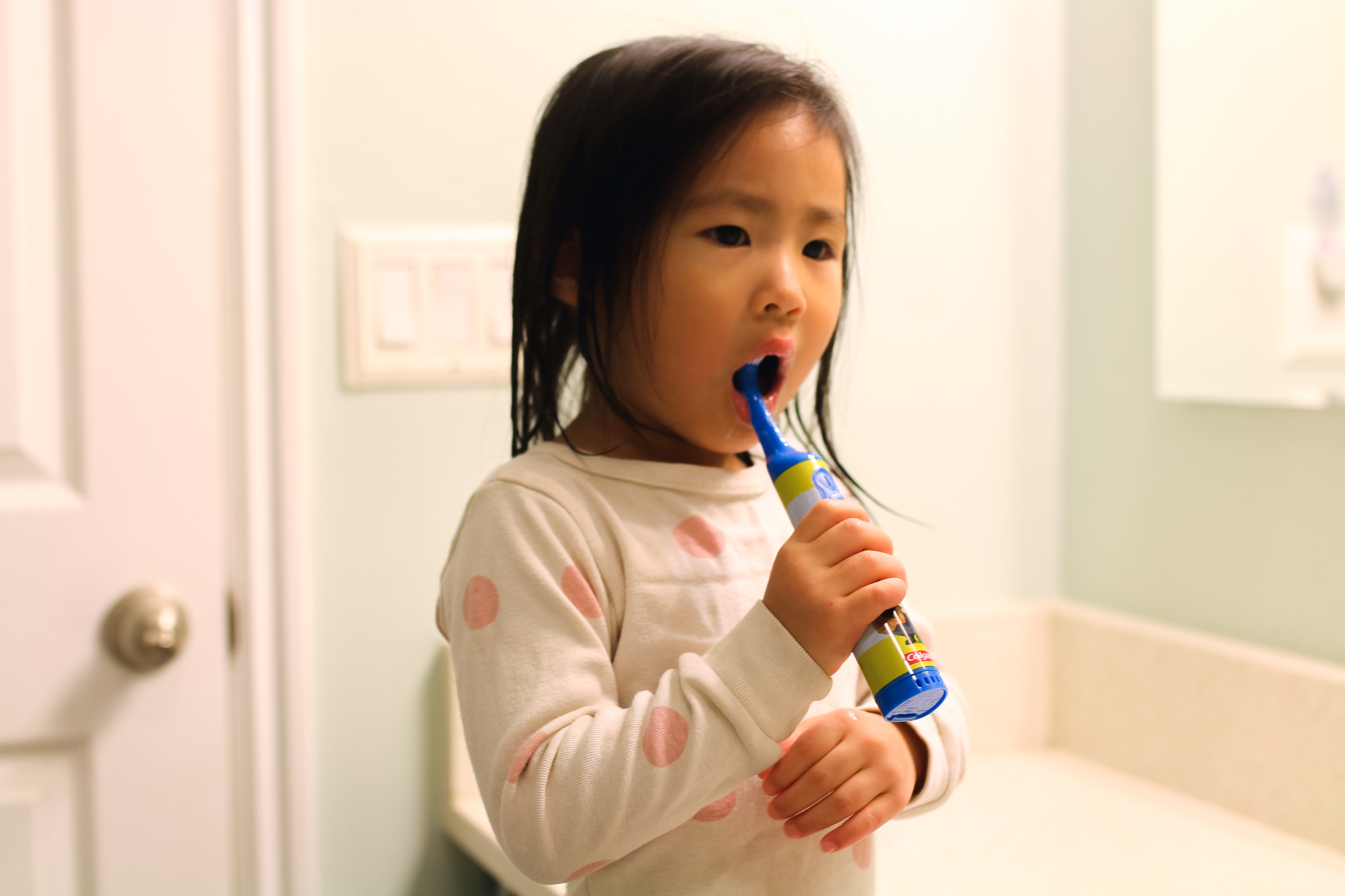 Child Brushing Teeth: How I Got My Kids To Brush Their Teeth For Two Whole Minutes by Utah lifestyle blogger Sandy A La Mode