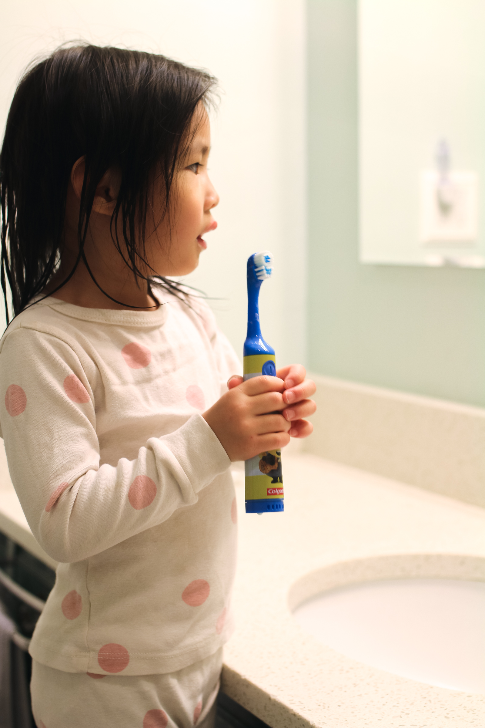 Child Brushing Teeth: How I Got My Kids To Brush Their Teeth For Two Whole Minutes by Utah lifestyle blogger Sandy A La Mode