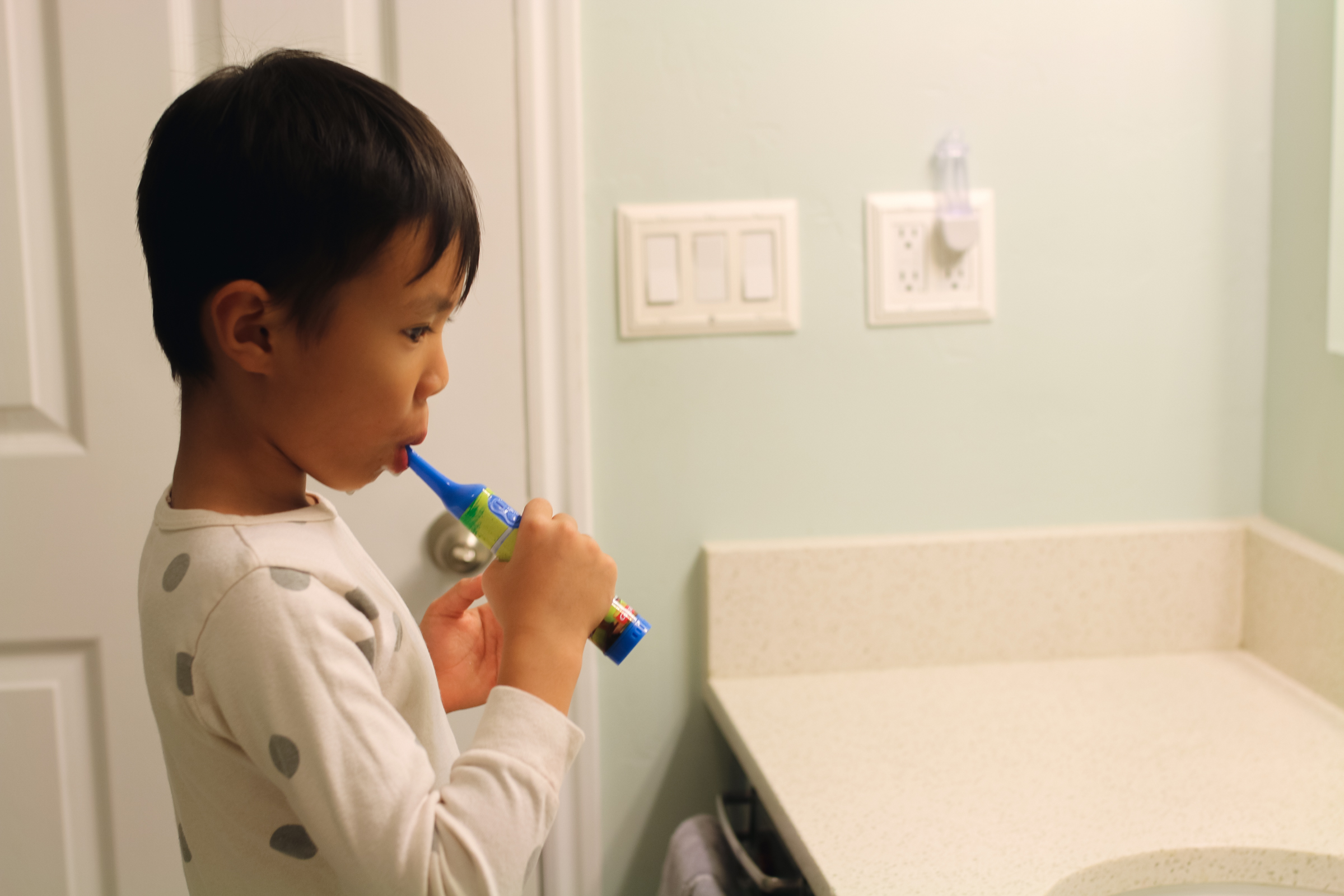 Child Brushing Teeth: How I Got My Kids To Brush Their Teeth For Two Whole Minutes by Utah lifestyle blogger Sandy A La Mode