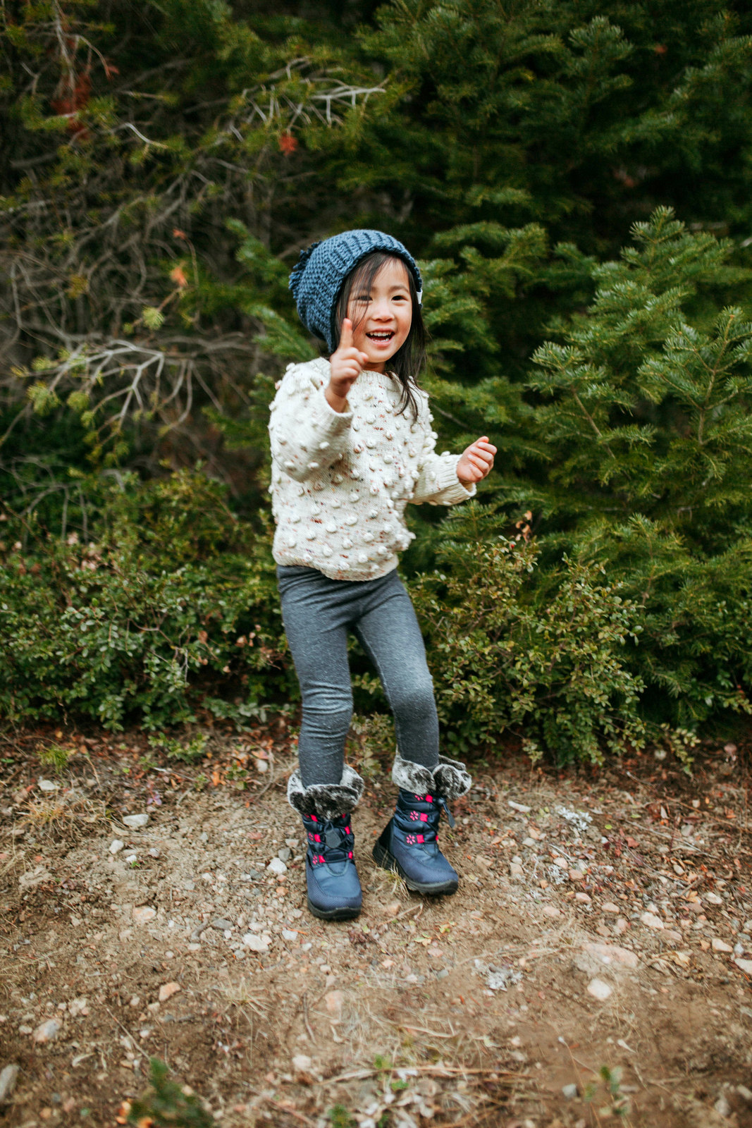 Mommy and Me Outfits: Pom Pom Sweater + Winter Boots by Utah fashion blogger Sandy A La Mode
