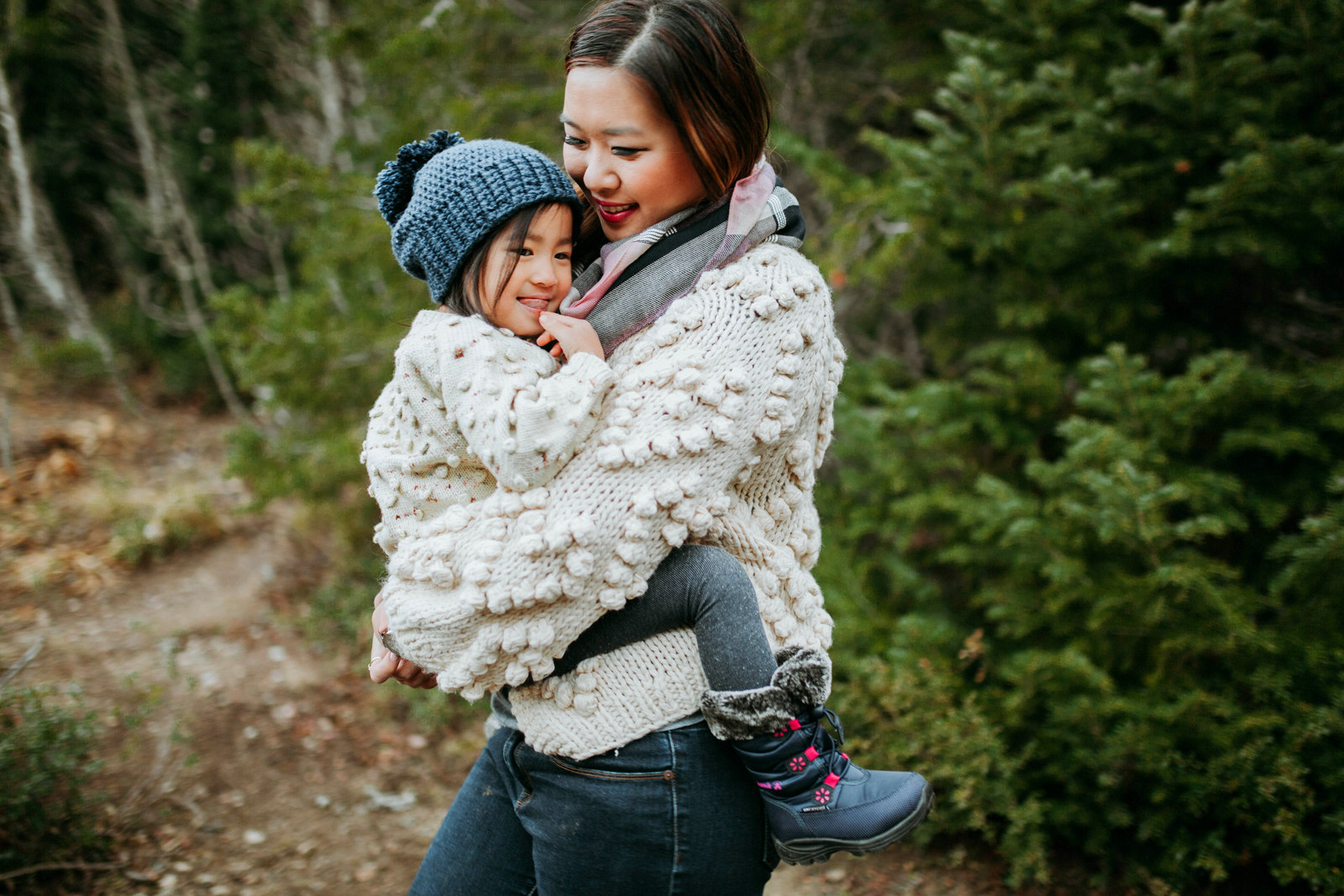 Mommy and Me Outfits: Pom Pom Sweater + Winter Boots by Utah fashion blogger Sandy A La Mode