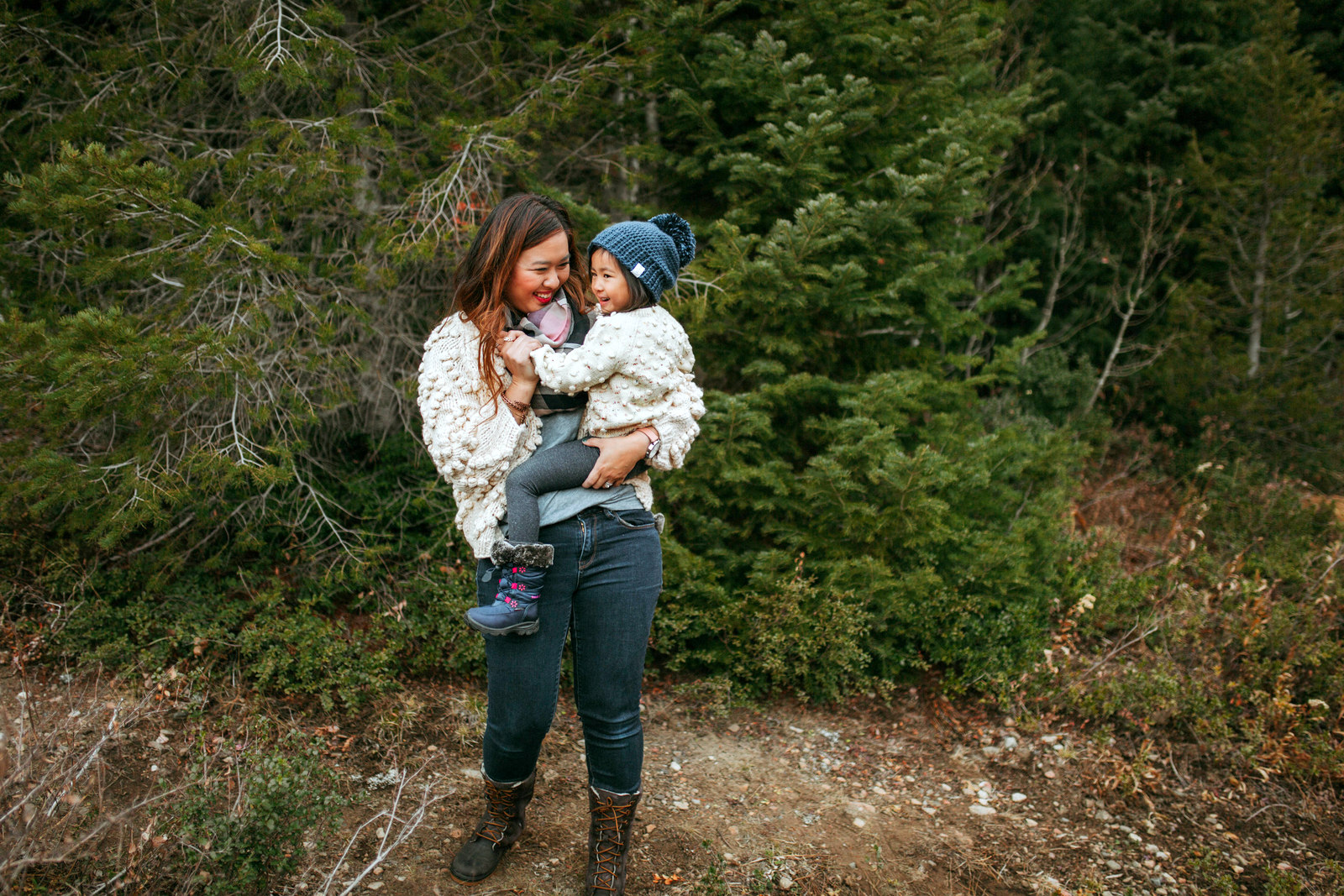 Mommy and Me Outfits: Pom Pom Sweater + Winter Boots by Utah fashion blogger Sandy A La Mode