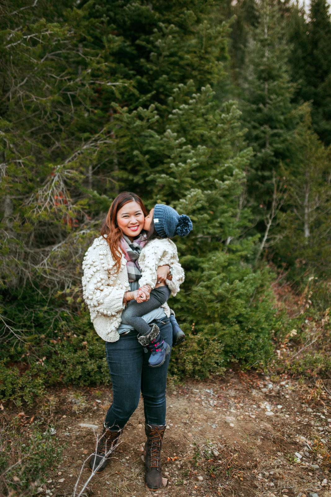 Mommy and Me Outfits: Pom Pom Sweater + Winter Boots by Utah fashion blogger Sandy A La Mode