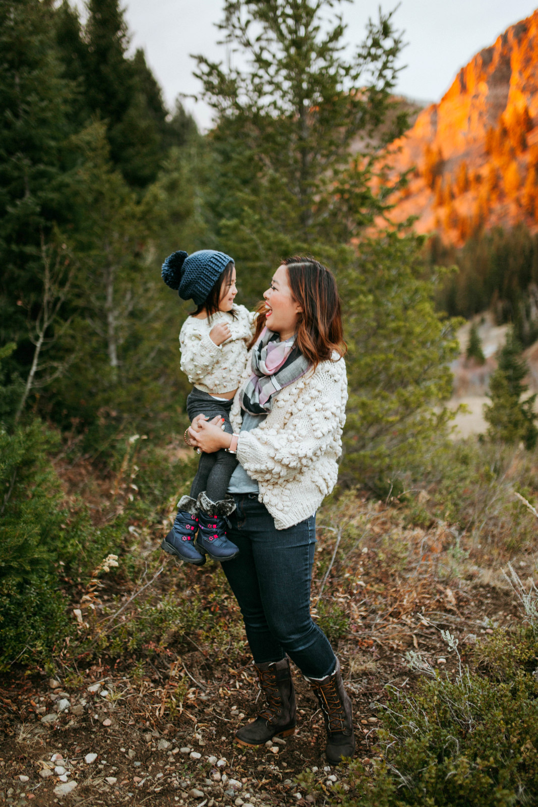 Mommy and Me Outfits: Pom Pom Sweater + Winter Boots by Utah fashion blogger Sandy A La Mode