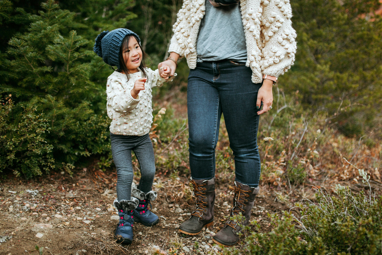 Mommy and Me Outfits: Pom Pom Sweater + Winter Boots by Utah fashion blogger Sandy A La Mode