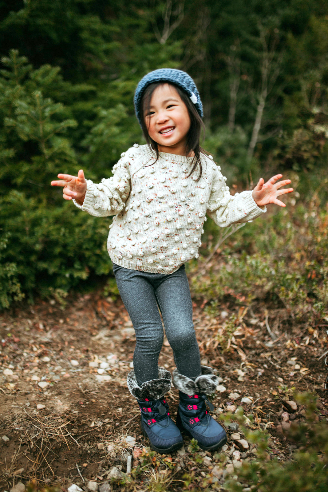 Mommy and Me Outfits: Pom Pom Sweater + Winter Boots by Utah fashion blogger Sandy A La Mode