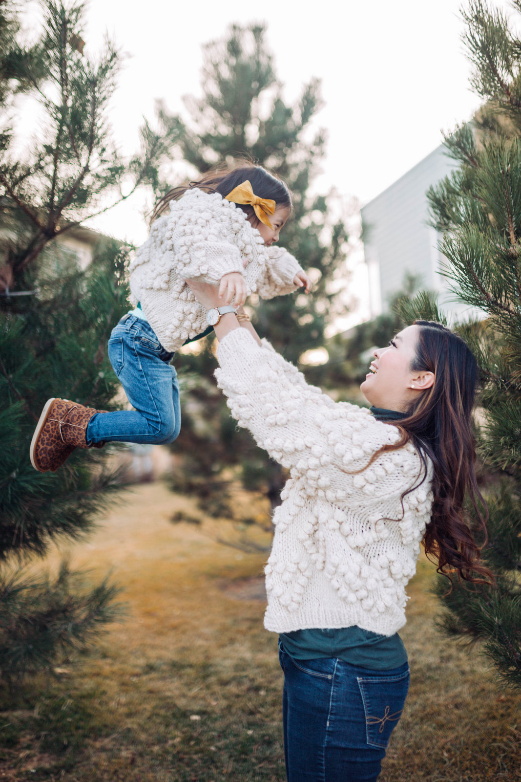 Mommy and Me Outfit: Pom Pom Cardigan and Leopard Boots by popular Utah style blogger Sandy A La Mode