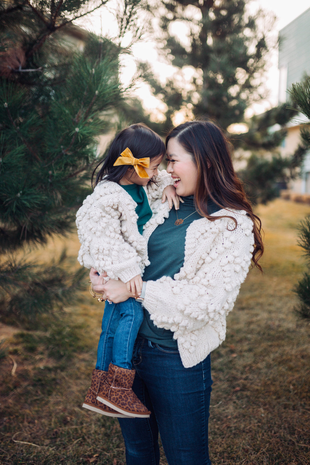 Mommy and Me Outfit: Pom Pom Cardigan and Leopard Boots by popular Utah style blogger Sandy A La Mode