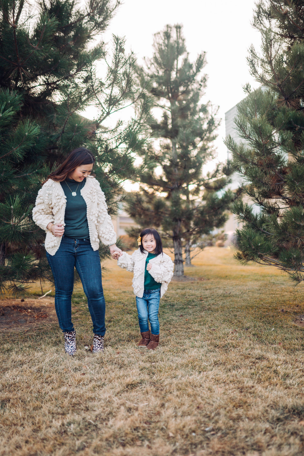 Mommy and Me Outfit: Pom Pom Cardigan and Leopard Boots by popular Utah style blogger Sandy A La Mode