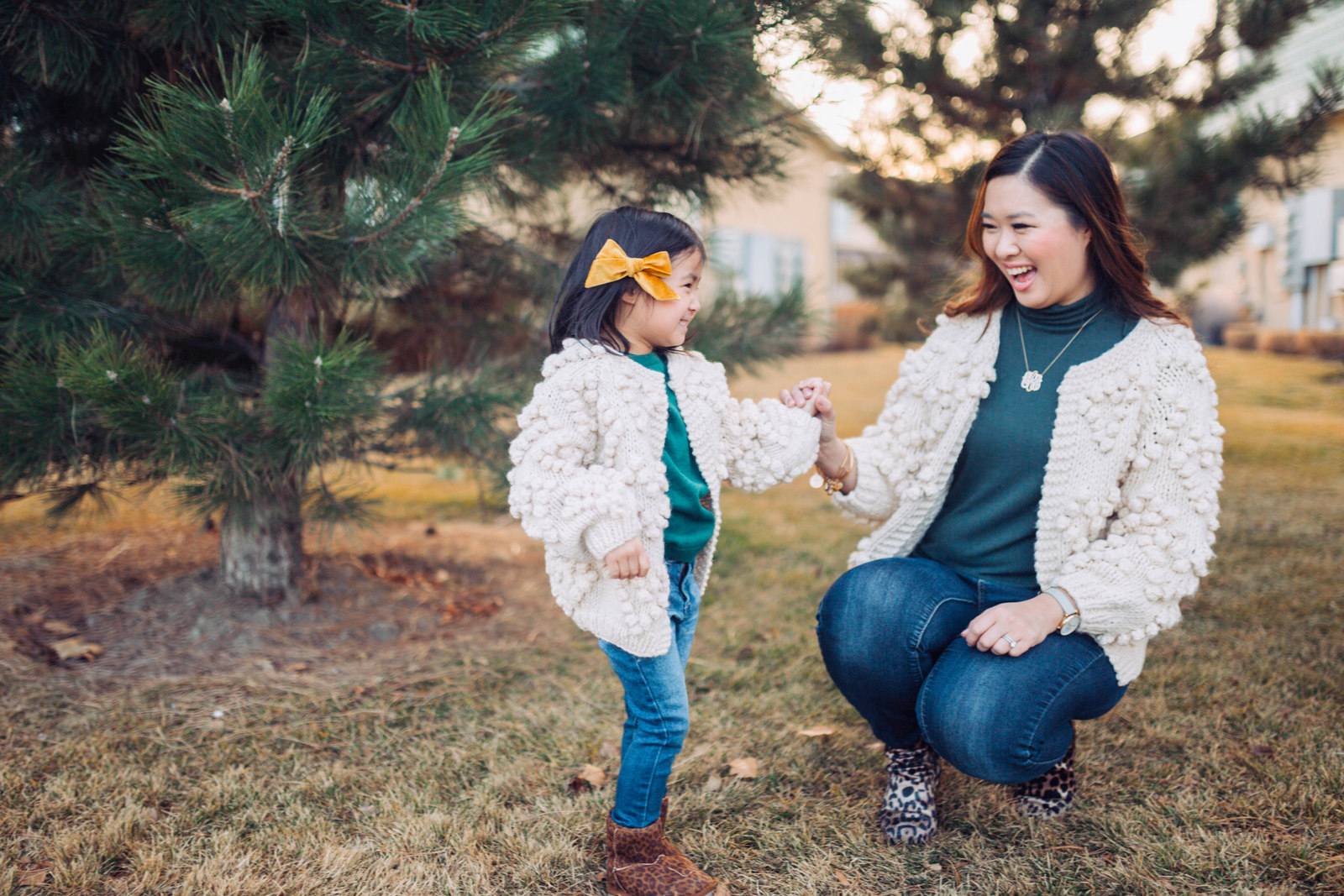 Mommy and Me Outfit: Pom Pom Cardigan and Leopard Boots by popular Utah style blogger Sandy A La Mode