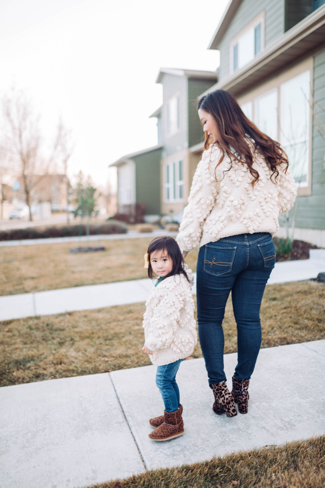 Mommy and Me Outfit: Pom Pom Cardigan and Leopard Boots by popular Utah style blogger Sandy A La Mode