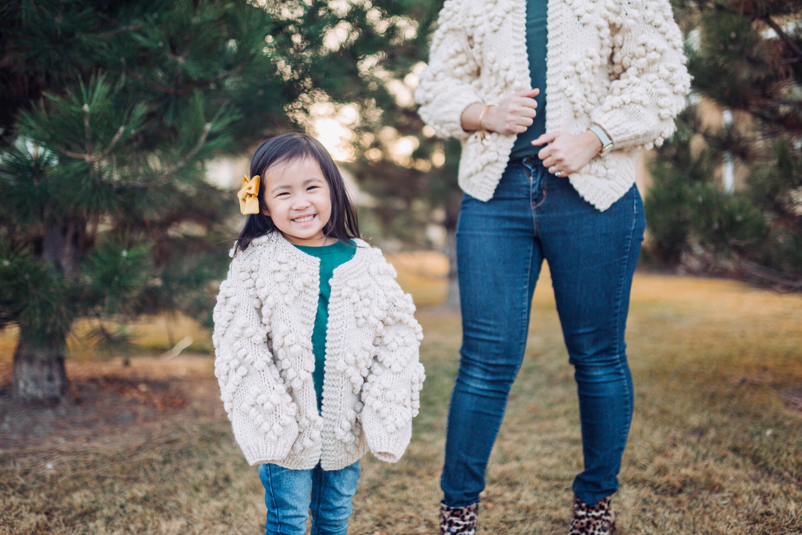 Mommy and Me Outfit: Pom Pom Cardigan and Leopard Boots by popular Utah style blogger Sandy A La Mode