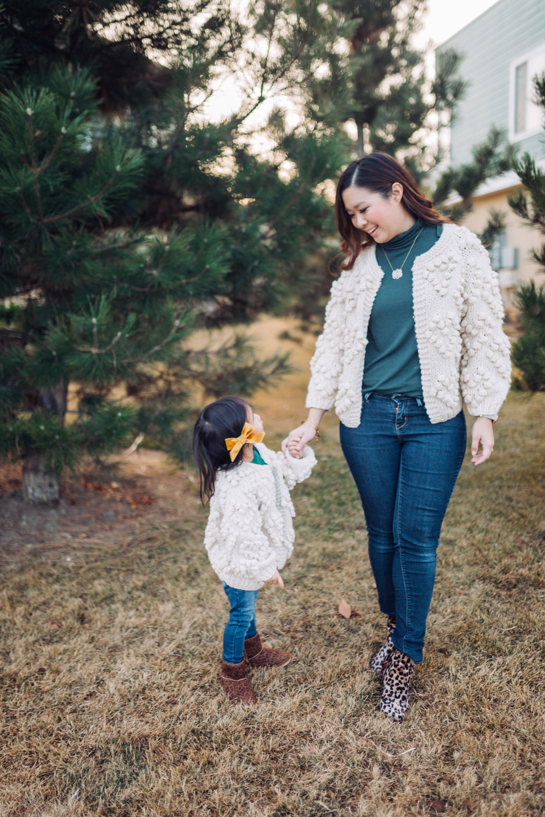 Mommy and Me Outfit: Pom Pom Cardigan and Leopard Boots by popular Utah style blogger Sandy A La Mode
